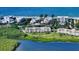 Aerial view of condo building near the water and beach at 4600 Gulf Of Mexico Dr # 206, Longboat Key, FL 34228