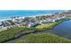 Aerial view showcasing a condo community near the beach at 4600 Gulf Of Mexico Dr # 206, Longboat Key, FL 34228
