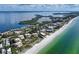 Aerial view of beachfront property and surrounding area at 4600 Gulf Of Mexico Dr # 206, Longboat Key, FL 34228