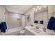 Clean bathroom with tub shower combo and modern vanity at 4600 Gulf Of Mexico Dr # 206, Longboat Key, FL 34228