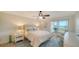 Spacious bedroom includes a ceiling fan, water views and ample natural light at 4600 Gulf Of Mexico Dr # 206, Longboat Key, FL 34228