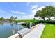Private dock with pathway and lush landscaping at 4600 Gulf Of Mexico Dr # 206, Longboat Key, FL 34228