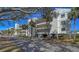 Condo building exterior showcasing architectural details and landscaping at 4600 Gulf Of Mexico Dr # 206, Longboat Key, FL 34228