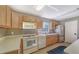 Well-equipped community kitchen with appliances at 4600 Gulf Of Mexico Dr # 206, Longboat Key, FL 34228