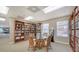 Community library with ample seating and books at 4600 Gulf Of Mexico Dr # 206, Longboat Key, FL 34228