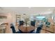 Bright living room with water views and comfortable seating at 4600 Gulf Of Mexico Dr # 206, Longboat Key, FL 34228