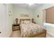 Cozy bedroom with a wooden bed frame and coastal decor at 4716 Foxtail Dr, Parrish, FL 34219