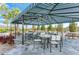 Community covered seating area with multiple tables and chairs at 4716 Foxtail Dr, Parrish, FL 34219