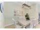 Dining area with light walls and farmhouse style table at 4716 Foxtail Dr, Parrish, FL 34219