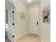 Bright entryway with tile flooring and access to other rooms at 4716 Foxtail Dr, Parrish, FL 34219