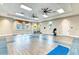 Fitness center with exercise equipment and yoga mats at 4716 Foxtail Dr, Parrish, FL 34219