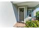 Inviting front entrance with wreath and sidelights at 4716 Foxtail Dr, Parrish, FL 34219