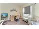 Bright home office features built-in desk and seating area at 4716 Foxtail Dr, Parrish, FL 34219