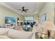 Spacious living room with lake views and comfortable seating at 4716 Foxtail Dr, Parrish, FL 34219