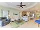 Open living space with a view into the kitchen at 4716 Foxtail Dr, Parrish, FL 34219