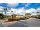 Impressive entrance to the Vilano community, showcasing a well-maintained landscape at 4986 Antiquity Way, Sarasota, FL 34240