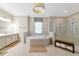 Luxurious bathroom with soaking tub, walk-in shower, and double vanity at 4986 Antiquity Way, Sarasota, FL 34240
