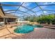 Resort-style pool and spa with screened enclosure at 4986 Antiquity Way, Sarasota, FL 34240