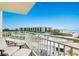 Balcony with outdoor seating and ocean views at 5830 Midnight Pass Rd # 502, Sarasota, FL 34242