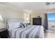 Beachfront bedroom with king-size bed and ocean view at 5830 Midnight Pass Rd # 502, Sarasota, FL 34242
