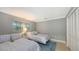 Bedroom with two twin beds, window and closet at 605 Wild Turkey Ln, Sarasota, FL 34236