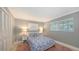 Bedroom with two twin beds, window, and closet at 605 Wild Turkey Ln, Sarasota, FL 34236