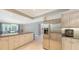 Updated kitchen with stainless steel appliances and granite counters at 605 Wild Turkey Ln, Sarasota, FL 34236