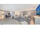 Open living area with access to the pool and kitchen at 605 Wild Turkey Ln, Sarasota, FL 34236