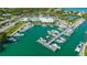 Aerial view of marina with many boats and docks at 605 Wild Turkey Ln, Sarasota, FL 34236