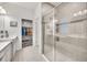 Spa-like bathroom with double vanity, large shower, and linen closet at 6609 114Th E Ave, Parrish, FL 34219
