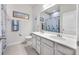 Clean bathroom with dual sinks, a shower/tub combo, and updated vanity at 6609 114Th E Ave, Parrish, FL 34219