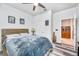 Cozy bedroom with wood-look floors and ample closet space at 6609 114Th E Ave, Parrish, FL 34219