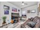 Relaxing common area with leather couch, large TV, and workspace at 6609 114Th E Ave, Parrish, FL 34219