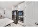 Kitchen features double oven and stainless steel refrigerator at 6609 114Th E Ave, Parrish, FL 34219