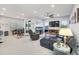 Spacious living room with comfortable seating, large TV, and aquarium at 6609 114Th E Ave, Parrish, FL 34219