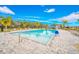 Inviting community pool with lounge chairs at 6609 114Th E Ave, Parrish, FL 34219