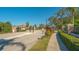 Gated community entrance with brick pillars and a security gate for residents at 6630 Horned Owl Pl, Sarasota, FL 34241