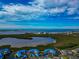 Wide aerial showcasing the community and surrounding waterways at 829 Audubon Dr # 829, Bradenton, FL 34209