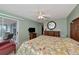Comfortable bedroom with access to a private balcony and water view at 829 Audubon Dr # 829, Bradenton, FL 34209