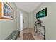 Bright condo entryway with decorative table and bench at 829 Audubon Dr # 829, Bradenton, FL 34209