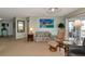 Living area with seating, large windows, and water views at 829 Audubon Dr # 829, Bradenton, FL 34209