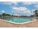 Relaxing community pool with patio and ample seating at 829 Audubon Dr # 829, Bradenton, FL 34209