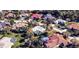 Overhead view of a residential neighborhood showing houses, roads, and landscaping at 8303 Deerbrook Cir, Sarasota, FL 34238