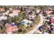 Bird's-eye view of a residential area with lush landscaping at 8303 Deerbrook Cir, Sarasota, FL 34238