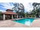 Resort-style community pool with a covered seating area at 8303 Deerbrook Cir, Sarasota, FL 34238