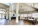 Bright community room with hardwood floors and high ceilings at 8303 Deerbrook Cir, Sarasota, FL 34238
