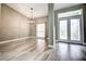 Bright dining room features tile floors and a chandelier at 8303 Deerbrook Cir, Sarasota, FL 34238