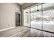 Gathering room with pool view and sliding glass doors at 8303 Deerbrook Cir, Sarasota, FL 34238