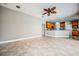 Kitchen features wood cabinets, granite counters, and stainless steel appliances at 8303 Deerbrook Cir, Sarasota, FL 34238