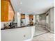 Modern kitchen with wood cabinets and granite countertops at 8303 Deerbrook Cir, Sarasota, FL 34238